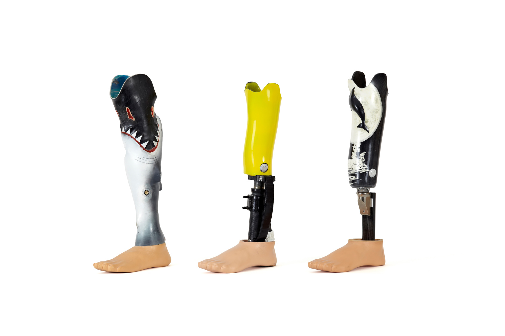 Three prosthetic legs.
